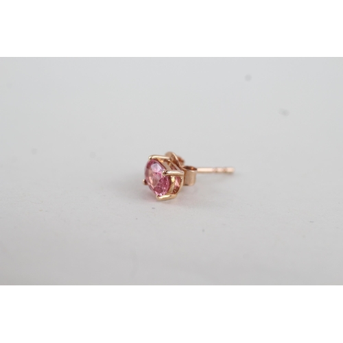 58 - 9ct rose gold pink sapphire set stud earrings (1.1g)