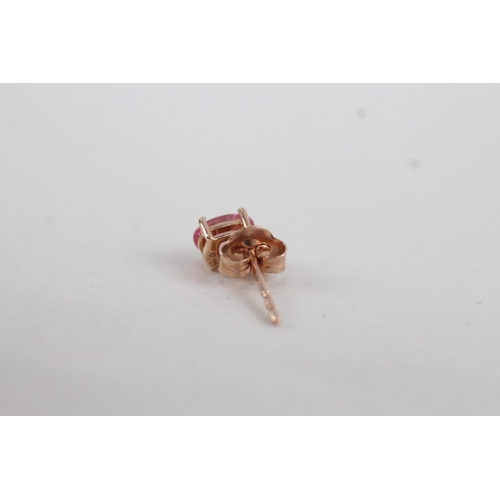 58 - 9ct rose gold pink sapphire set stud earrings (1.1g)