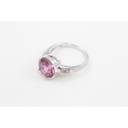 59 - 9ct white gold enhanced pink topaz and white gemstone set dress ring (3.9g) Size  N