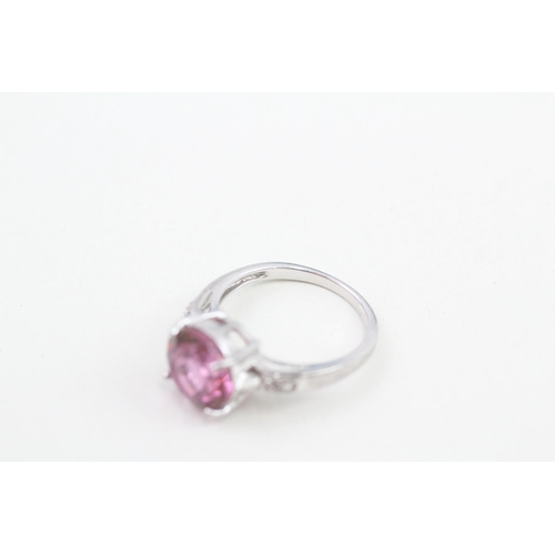 59 - 9ct white gold enhanced pink topaz and white gemstone set dress ring (3.9g) Size  N