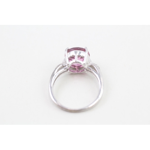 59 - 9ct white gold enhanced pink topaz and white gemstone set dress ring (3.9g) Size  N