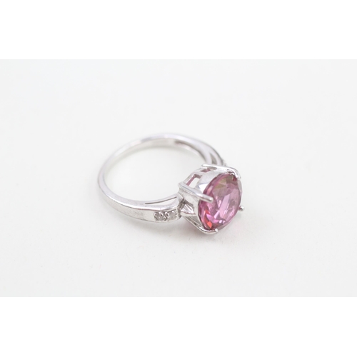 59 - 9ct white gold enhanced pink topaz and white gemstone set dress ring (3.9g) Size  N