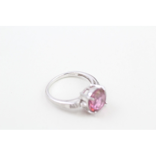 59 - 9ct white gold enhanced pink topaz and white gemstone set dress ring (3.9g) Size  N