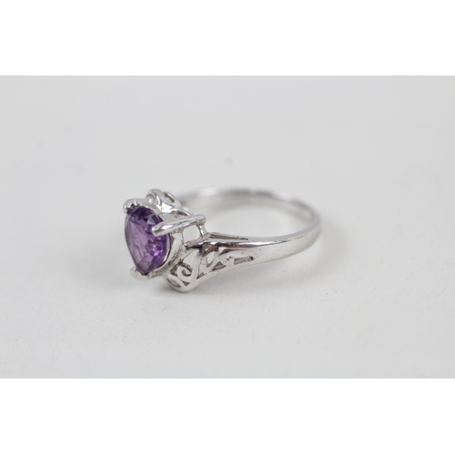 66 - 9ct white gold heart cut amethyst set dress ring (2g) Size  I