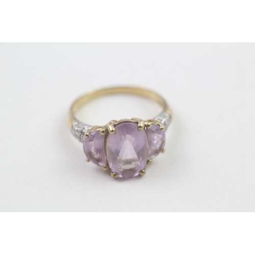 68 - 9ct gold amethyst and diamond trilogy ring (3.6g) Size  Q