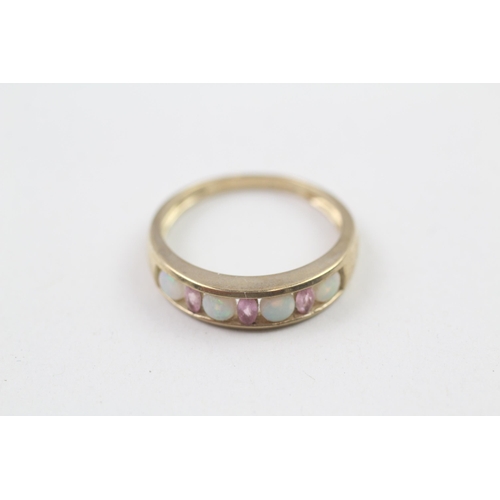 70 - 9ct gold opal and amethyst channel setting ring (2.7g) Size  Q 1/2