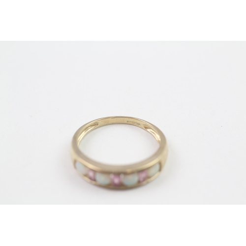 70 - 9ct gold opal and amethyst channel setting ring (2.7g) Size  Q 1/2