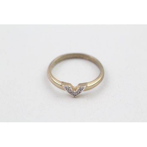 71 - 9ct gold diamond flat set chevron ring (1.7g) Size  M