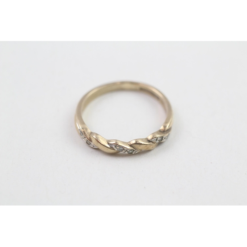 73 - 9ct gold diamond flat setting twist ring (1.8g) Size  N