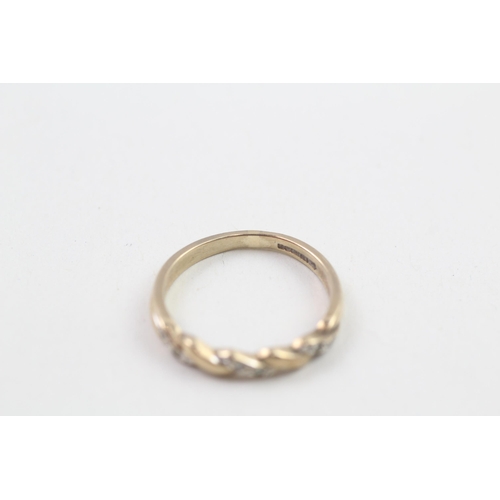 73 - 9ct gold diamond flat setting twist ring (1.8g) Size  N