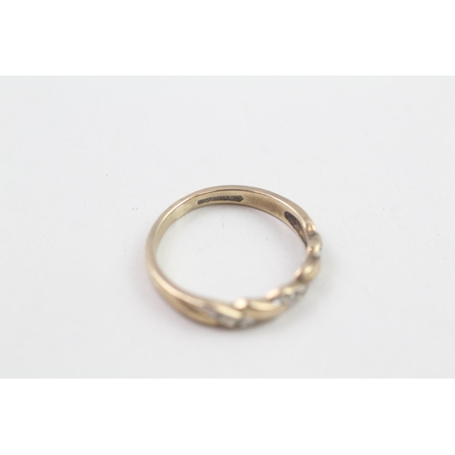 73 - 9ct gold diamond flat setting twist ring (1.8g) Size  N