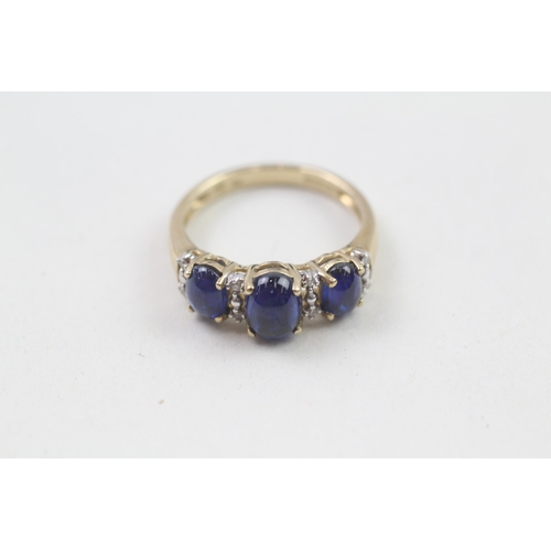 75 - 9ct gold sapphire and diamond cabochon trilogy ring (2.5g) Size  L 1/2