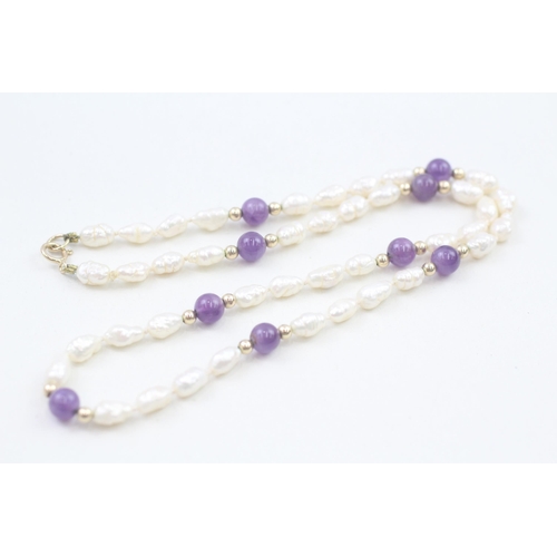 76 - 9ct gold amethyst and pearl clasped necklace with gold spacer beads (11.4g)