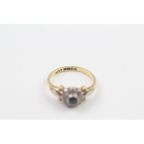 77 - 18ct gold sapphire and diamond halo ring (2.8g) Size  J