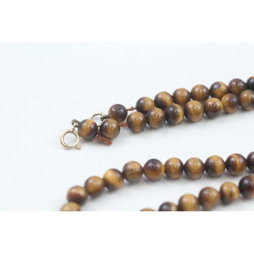 78 - 9ct gold clasp tigers eye beaded necklace (21.3g)