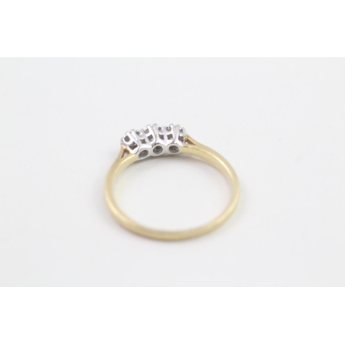 82 - 18ct gold diamond three stone ring (2.7g) Size  P