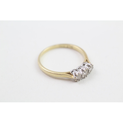 82 - 18ct gold diamond three stone ring (2.7g) Size  P