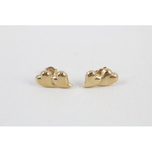 86 - 9ct gold duo heart shaped stud earrings (0.5g)