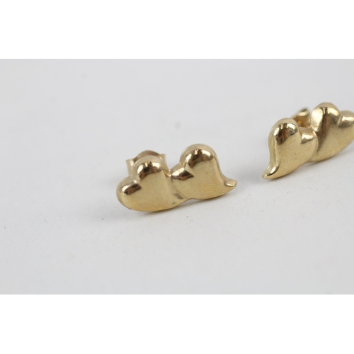 86 - 9ct gold duo heart shaped stud earrings (0.5g)