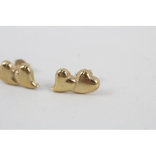 86 - 9ct gold duo heart shaped stud earrings (0.5g)