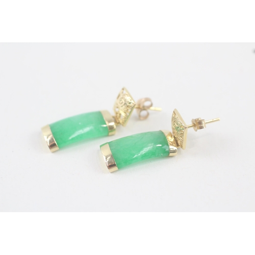 87 - 14ct gold jade drop earring with Chinese symbols, 9ct gold backs (3.4g)