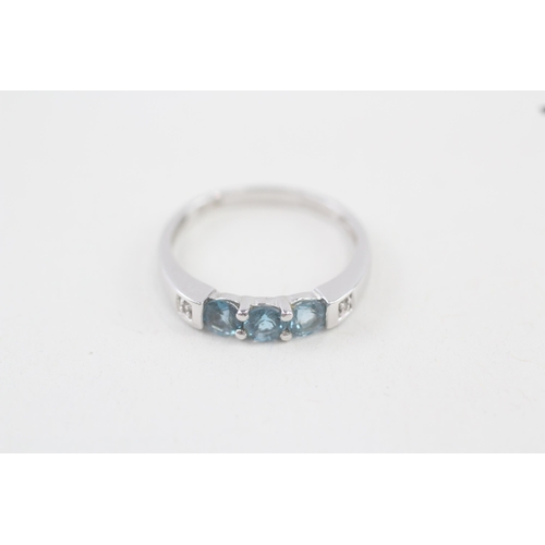 98 - 9ct gold blue topaz & diamond ring (1.5g) Size  K