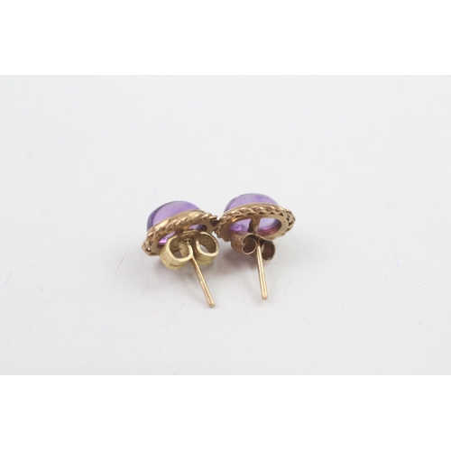 108 - 9ct gold cabochon cut stud earrings with scroll backs (1.3g)