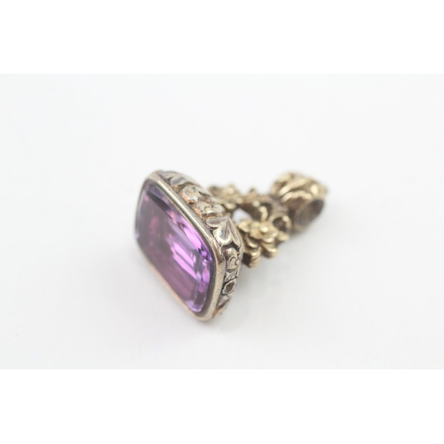 112 - 9ct gold antique foiled back amethyst set fob (13.4g)