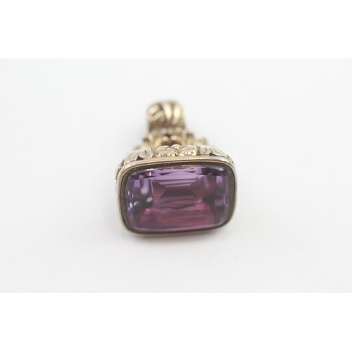 112 - 9ct gold antique foiled back amethyst set fob (13.4g)