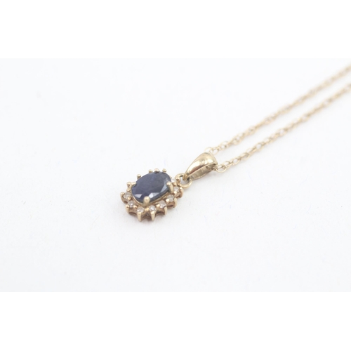 113 - 9ct gold diamond and sapphire set cluster pendant necklace (1.4g)