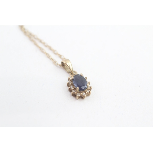 113 - 9ct gold diamond and sapphire set cluster pendant necklace (1.4g)