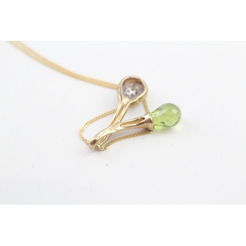 117 - 9ct gold pave set diamond and briolette peridot pendant necklace (2.1g)