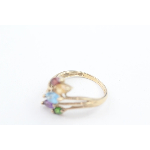 119 - 9ct gold marquise cut diopside, amethyst, topaz, citrine, and garnet set bypass ring (3.4g) Size  S