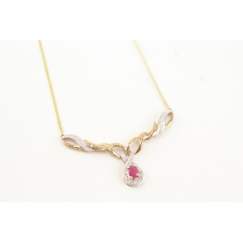 23 - 9ct gold ruby & diamond static pendant necklace (5.2g)