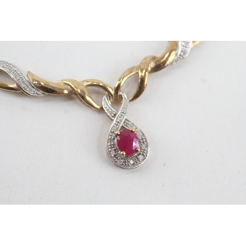 23 - 9ct gold ruby & diamond static pendant necklace (5.2g)