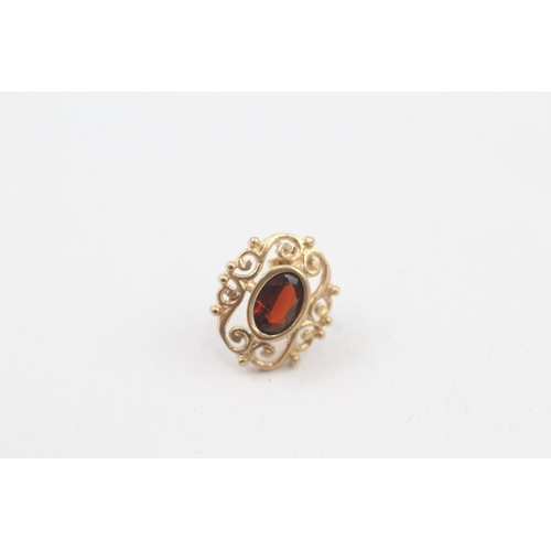 24 - 9ct gold garnet stud earrings with scroll backs (1g)