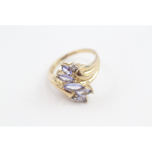 28 - 9ct gold marquise cut tanzanite & diamond dress ring (3.2g) Size  M