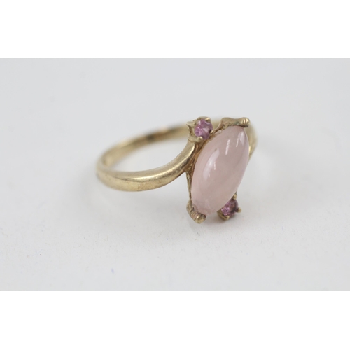 40 - 9ct gold pink gemstone accented marquise cabochon rose quartz bypass ring (2.8g) Size  R