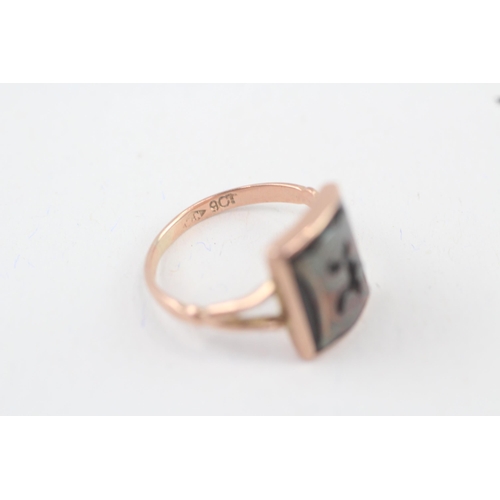 49 - 9ct rose gold onyx set gothic letter 