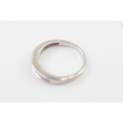 50 - 9ct white gold channel set pink sapphire half hoop eternity ring (2.3g) Size  N