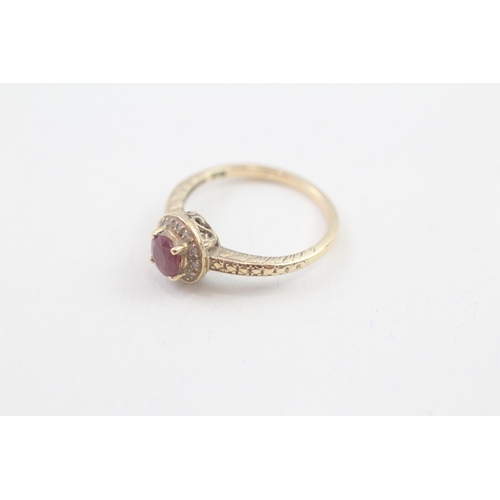 54 - 9ct gold diamond accented ruby halo ring (1.7g) Size  L