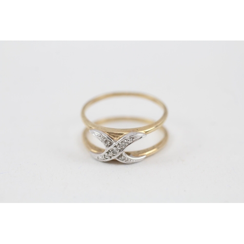 65 - 9ct gold diamond set kiss cross double band ring (2.3g) Size  N