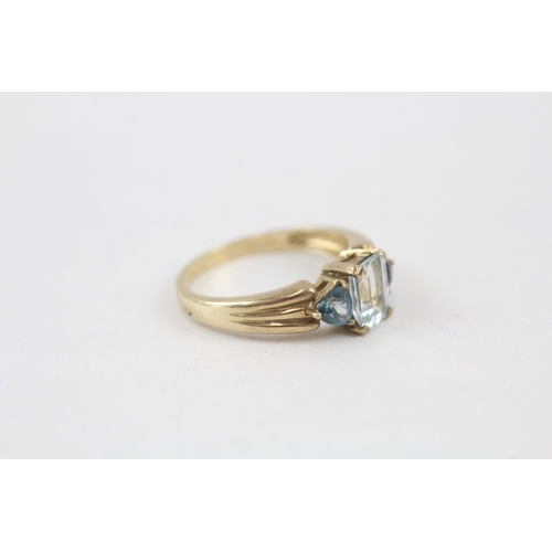 66 - 9ct gold london blue and sky blue topaz set trilogy ring (2.9g) Size  N