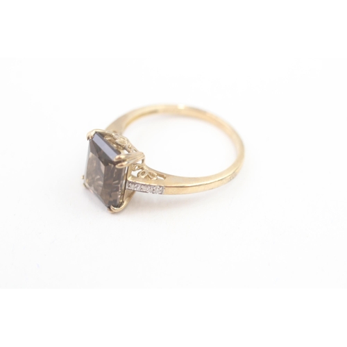 68 - 9ct gold diamond accented smokey quartz set cocktail ring (3.3g) Size  S 1/2