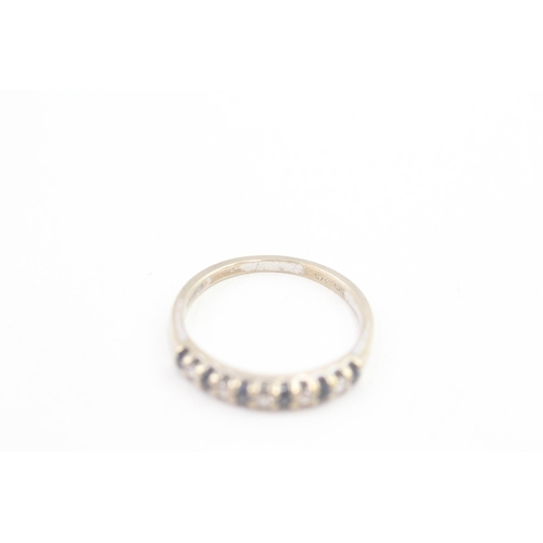 72 - 9ct gold diamond and sapphire set half hoop eternity ring (1.7g) Size  N