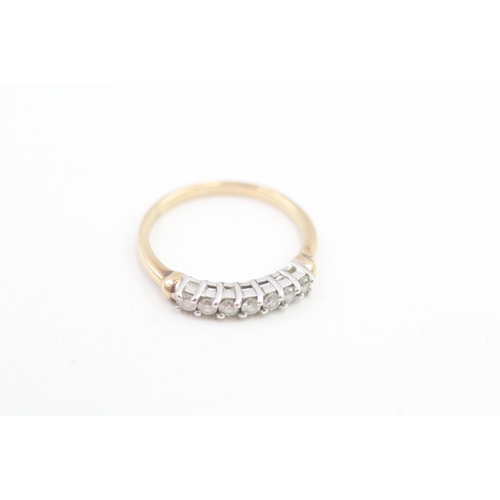 73 - 9ct gold diamond set seven stone eternity ring (1.5g) Size  J 1/2