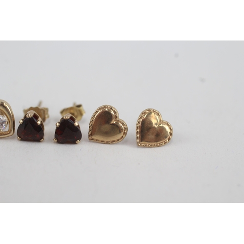 77 - 3x 9ct gold garnet, cubic zirconia heart shaped stud earrings (1.2g)