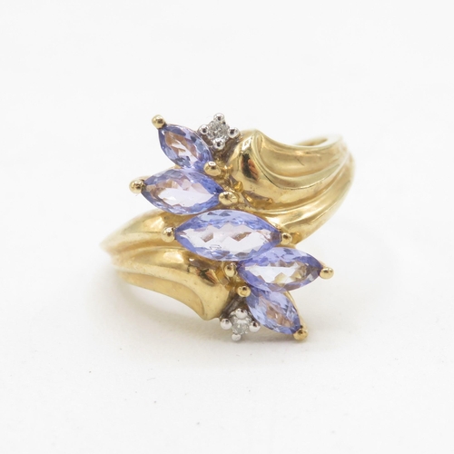 28 - 9ct gold marquise cut tanzanite & diamond dress ring (3.2g) Size  M