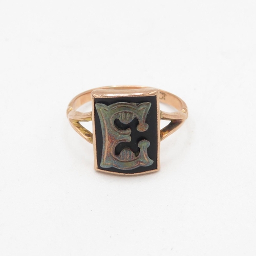 49 - 9ct rose gold onyx set gothic letter 