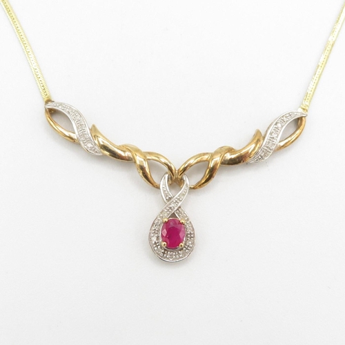 23 - 9ct gold ruby & diamond static pendant necklace (5.2g)